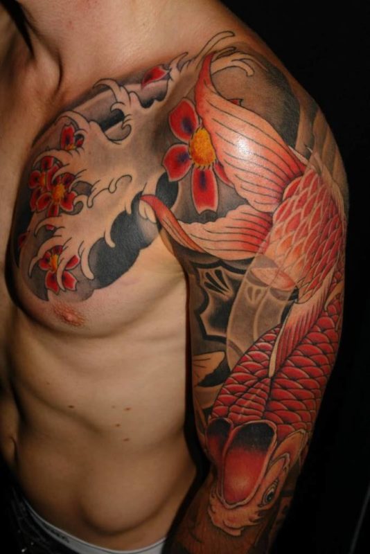 Elegant Fish Shoulder Tattoo Design