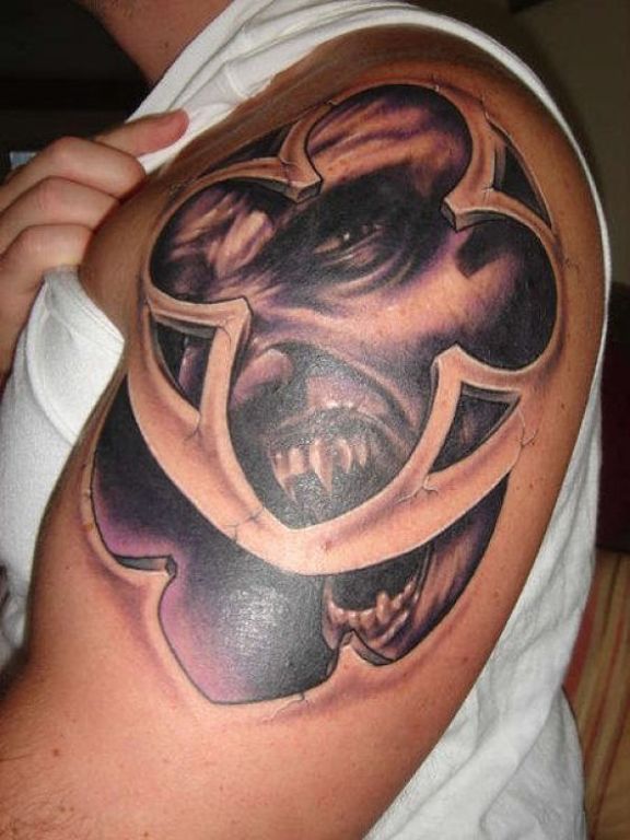Evil Tattoo On Left Shoulder