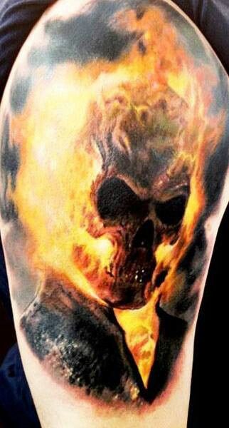 Flaming Skull Tattoo On Left Shoulder