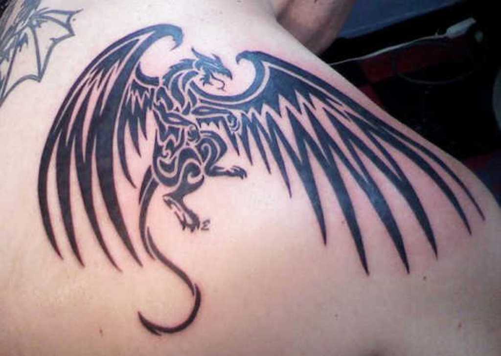 1. Dragon Shoulder Tattoo Designs - wide 2