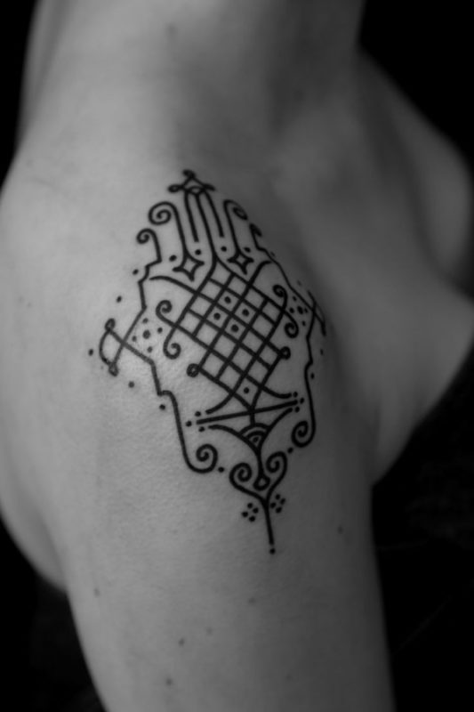 Geometric Black Tattoo Design