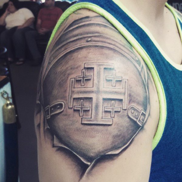 Grey Ink Armor Shoulder Tattoo