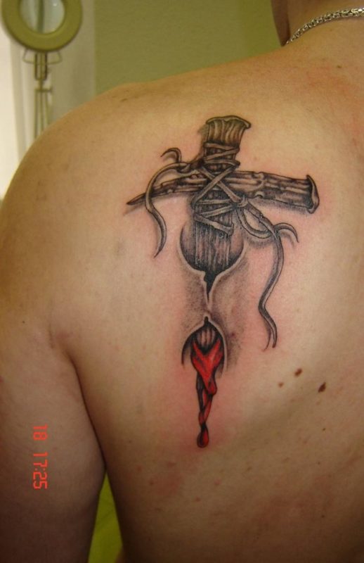 Grey Ink Bleeding Cross Tattoo