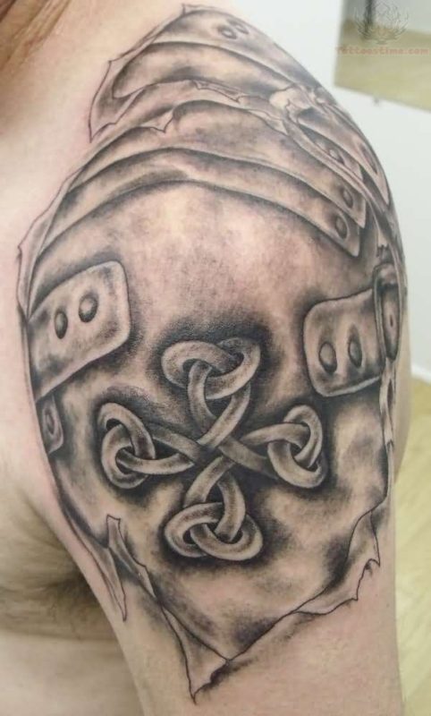 Grey Ink Celtic Armor Shoulder Tattoo