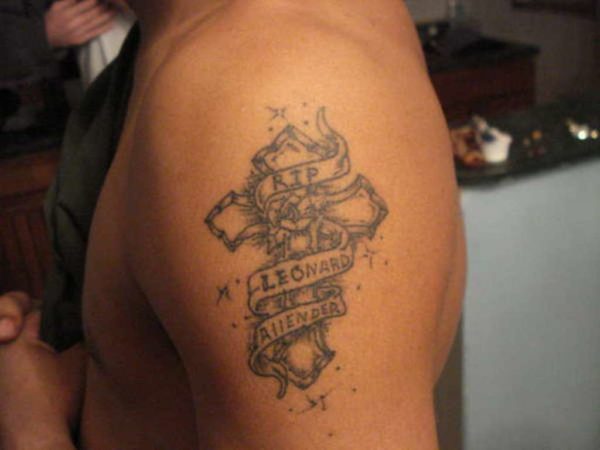 Grey Ink Cross Rip Tattoo