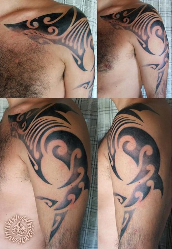 Grey Ink Tribal Shoulder Tattoo