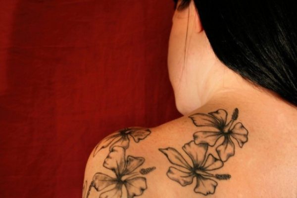 Grey Liliy Tattoo On Back Shoulder