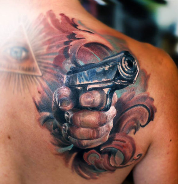 Gun Shoulder Blade Tattoo Design