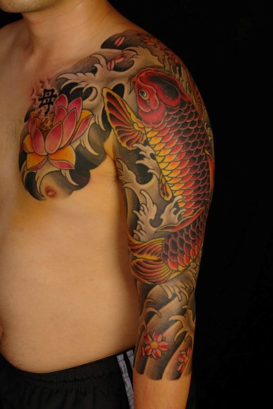 Impressive Fish Designer Shoulder Tattoo