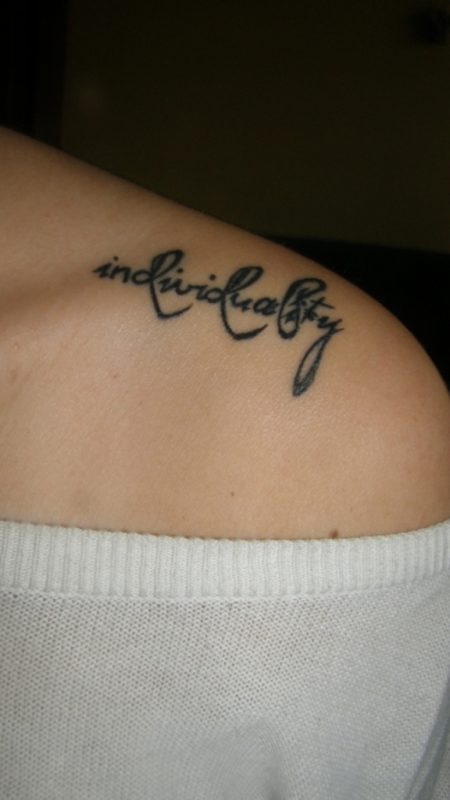 Individuality Lettering Tattoo