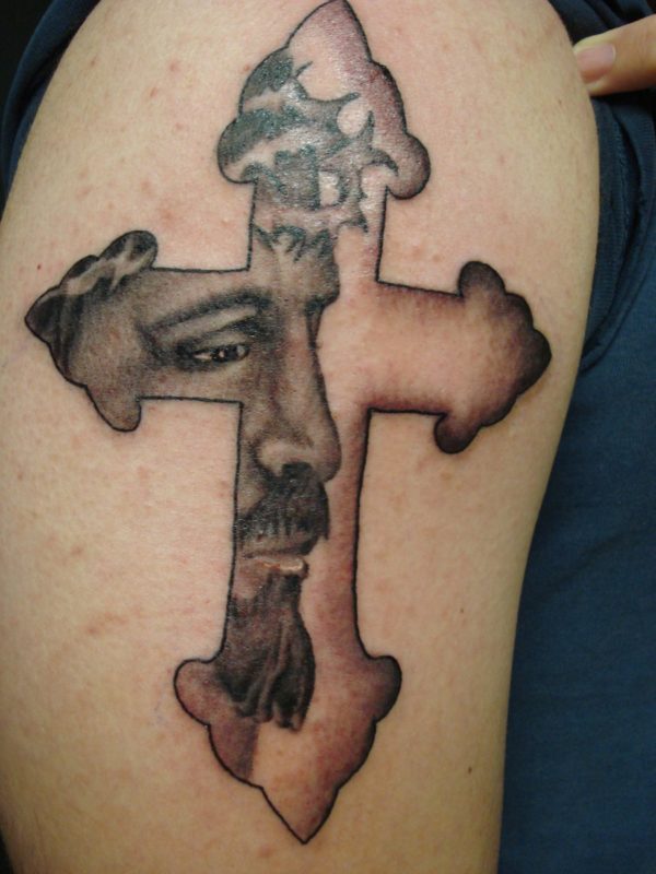 Jesus Face In Cross Tattoo