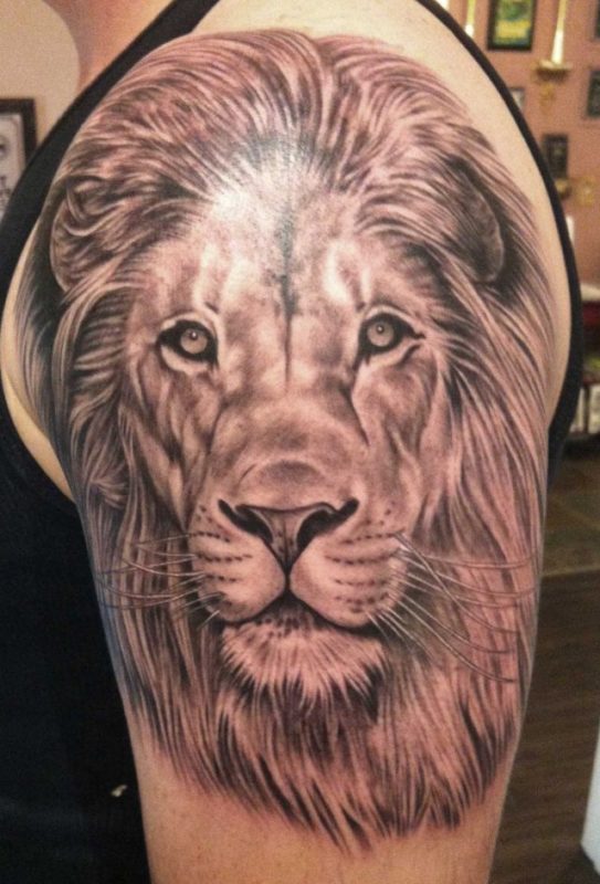 Leo Tattoo On Left Shoulder