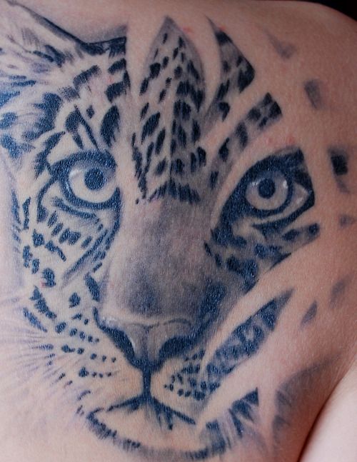 Leopard Face Tattoo