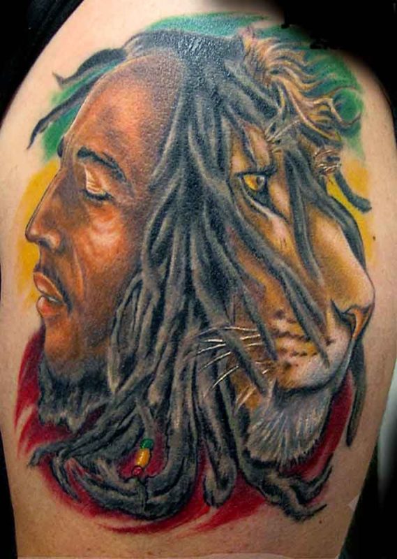 Lion And Man Shoulder Tattoo