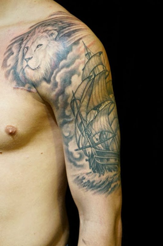 Lion And Ship Tattoo