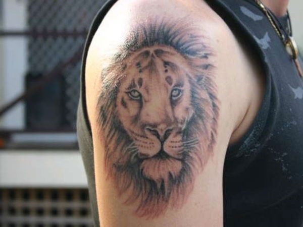 Lion Face Shoulder Blade Tattoo