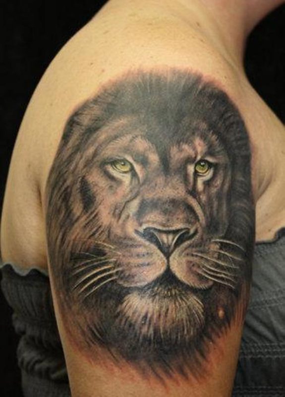 Lion Face Tattoo On Right Shoulder