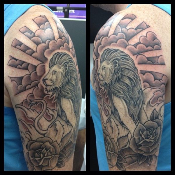 Lion In Cloud Tattoo