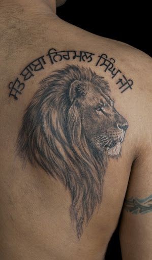 Lion Shoulder Blade Tattoo Design
