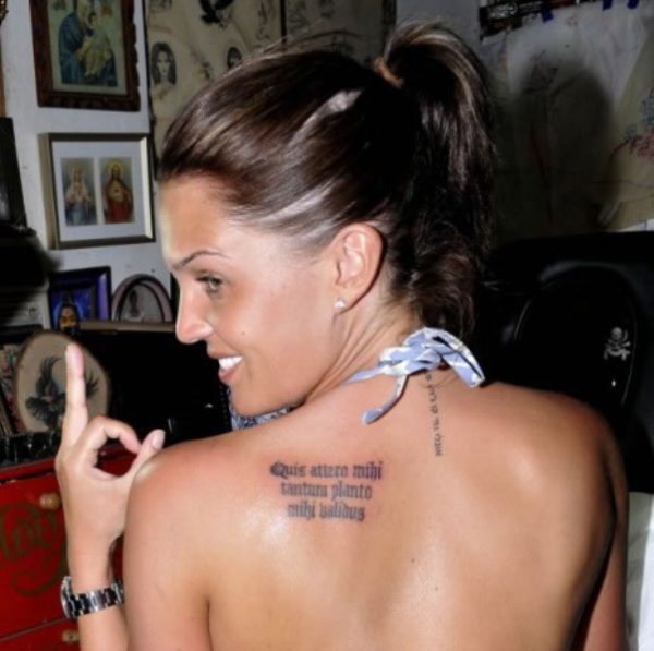 Literacy Tattoo On Left Back