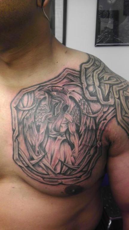 Lovely Armour Tattoo On Shoulder