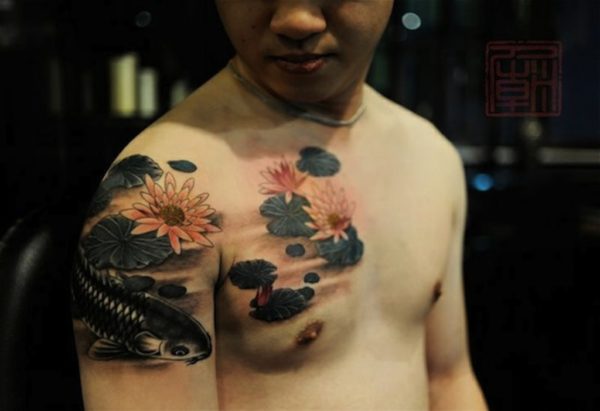 Lovely Fish And Flower Tattoo