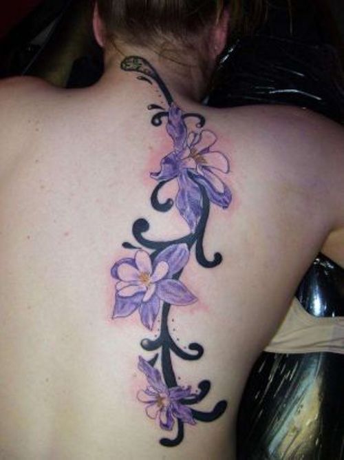 Lovely Purple Tattoo On On Back Shoulder
