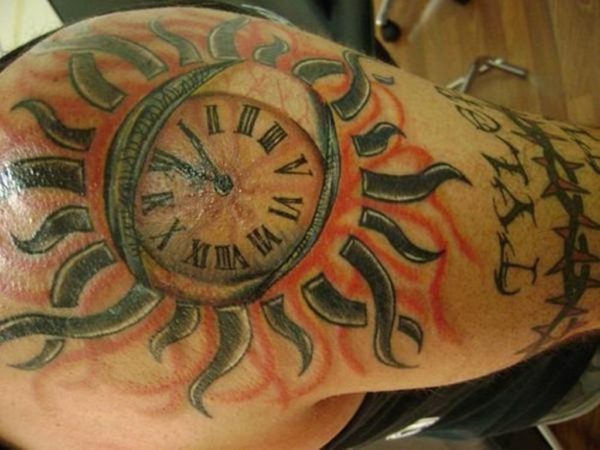 Lovely Sun Tattoo On Shoulder