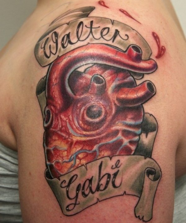 Massive Realistic Colored Heart Lettering Tattoo