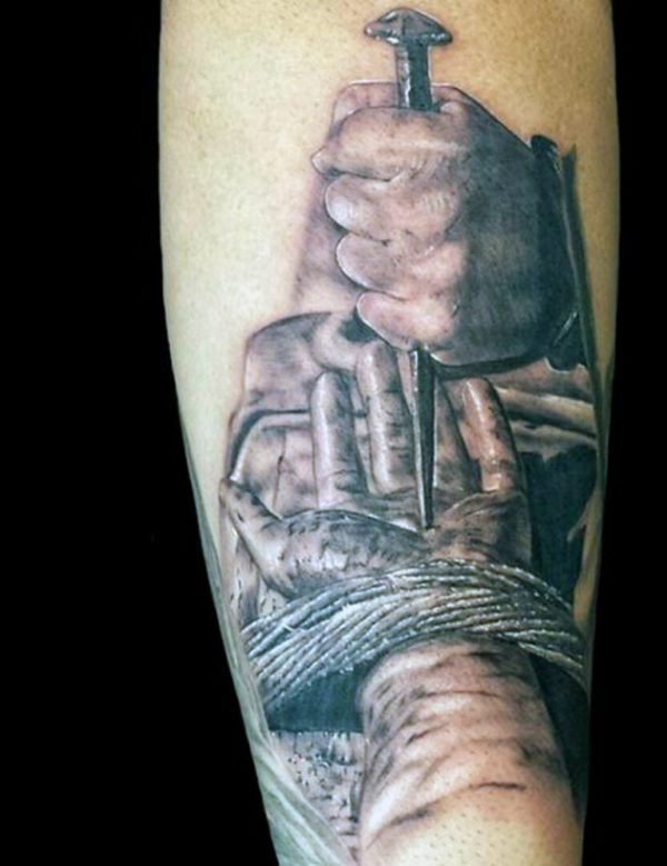 Nail In Jesus Hand Tattoo