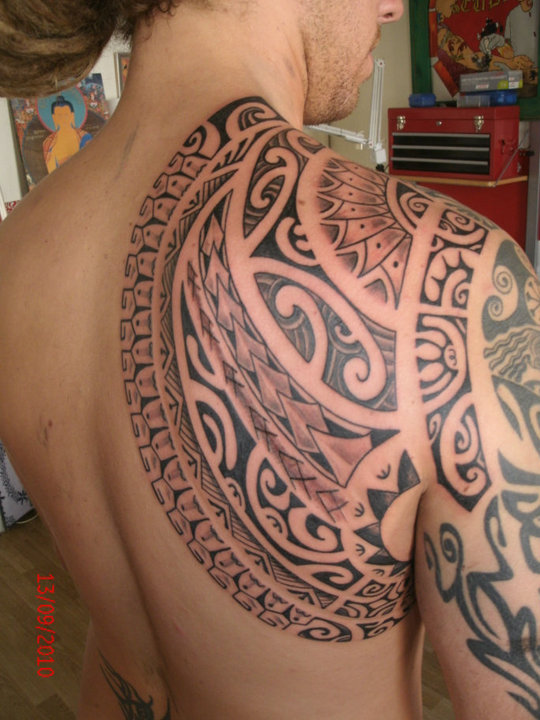 Nice Black Maori Tattoo On Shoulder Black