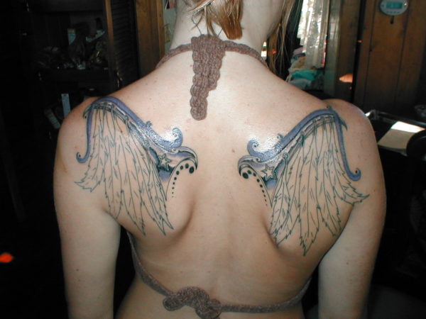 Nice Grey Ink Wings Tattoo
