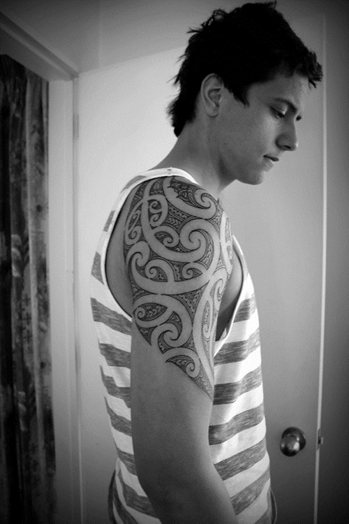 Nice Tribal Black And White Tattoo