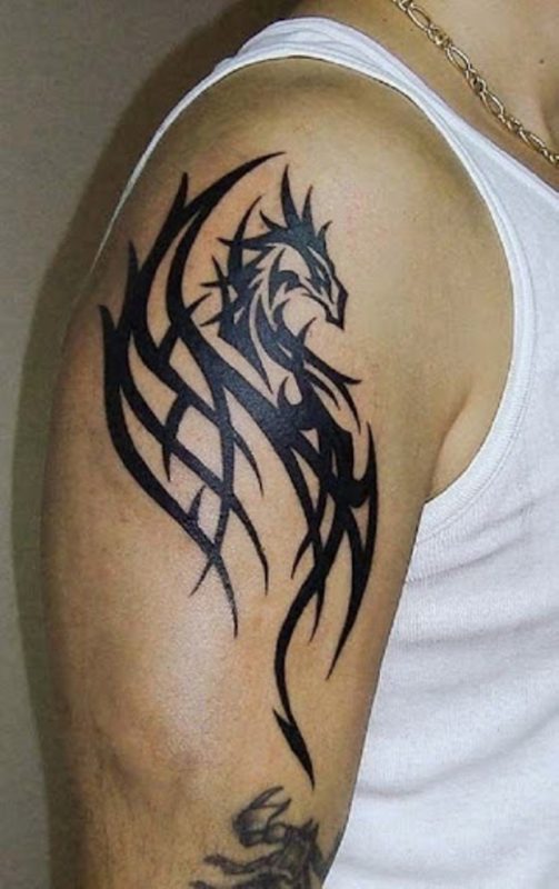 Nice Tribal Dragon Shoulder Tattoo