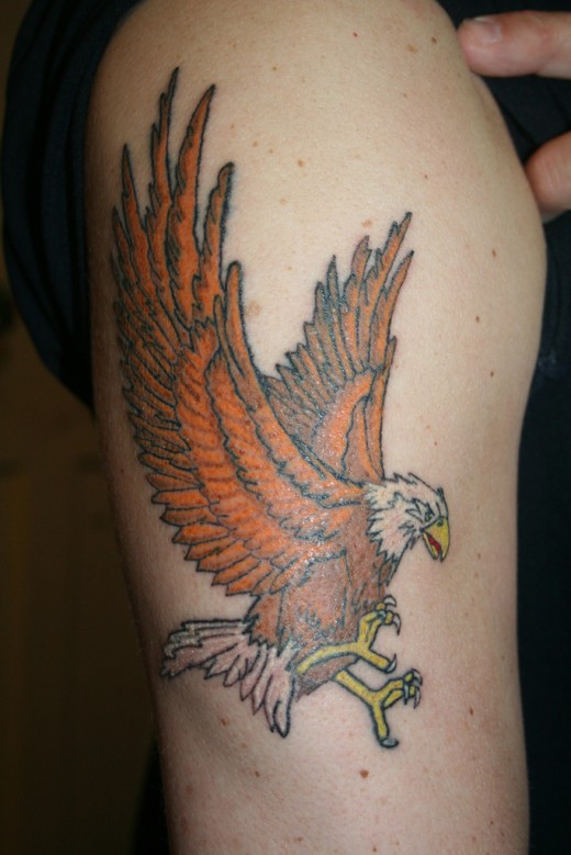 Orange Eagle Shoulder Tattoo Design