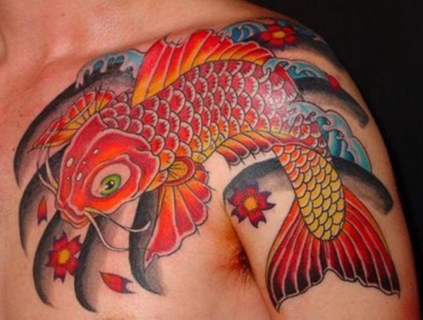 Orange Fish Tattoo On Left Shoulder