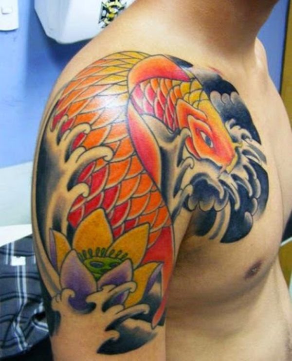 Orange Fish Tattoo On Right Shoulder