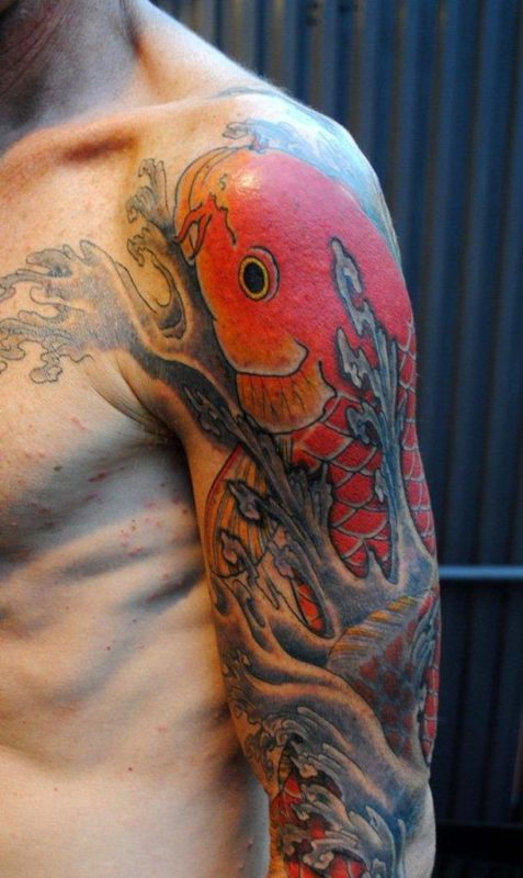 Orange Fish Tattoo On Shoulder