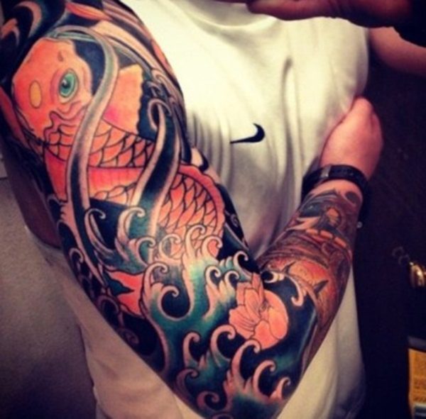 Outstanding Fish Tattoo On Right Shoulder