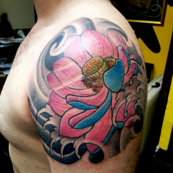 Pink Flower Tattoo On Left Shoulder