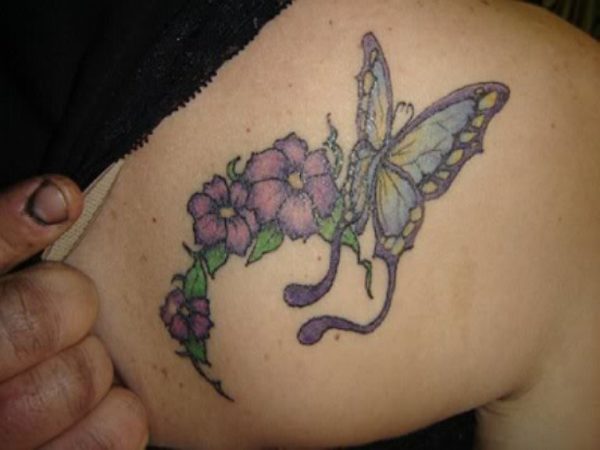 Pink Flowers And Butterfly Tattoo