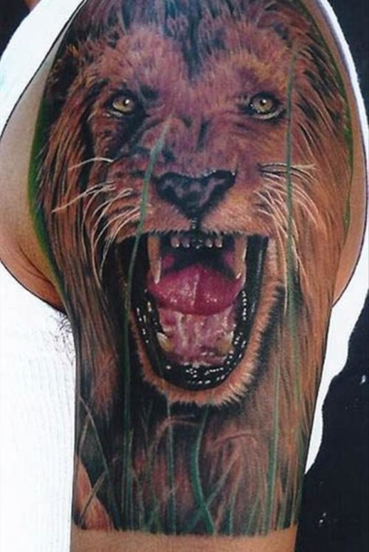 Realistic Lion Face Tattoo Design