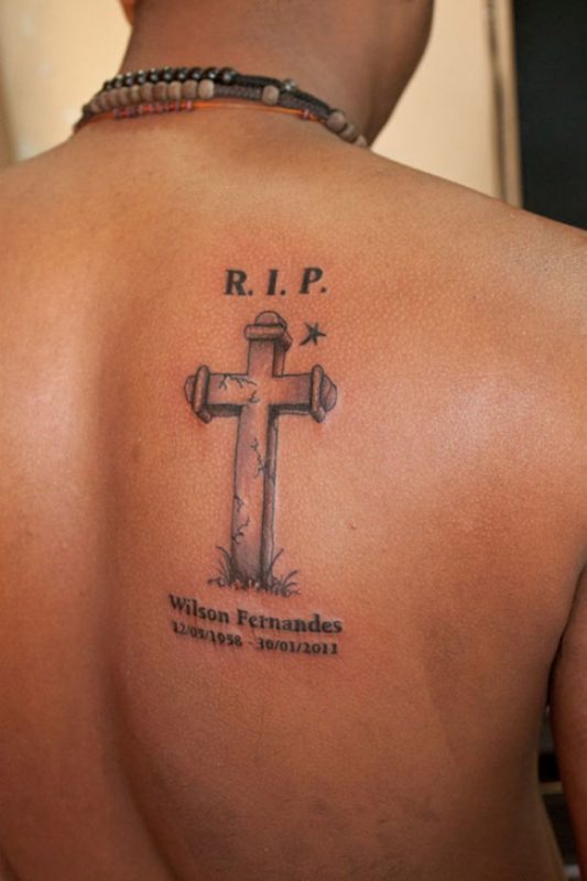 Rip Cross Tattoo Design