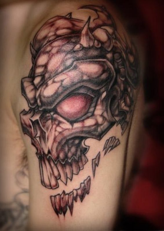 Ripped Man Skull Tattoo