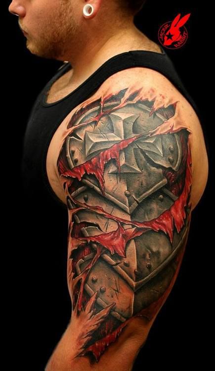 Ripped Skin Armour Tattoo On Left Shoulder