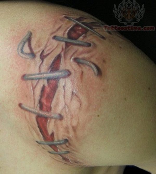 Ripped Skin Back Tattoo