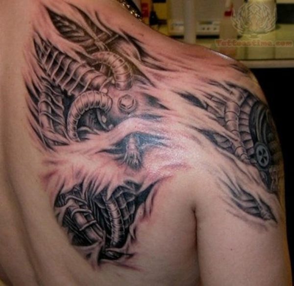 Ripped Skin Mechanical Tattoo On Shoulder