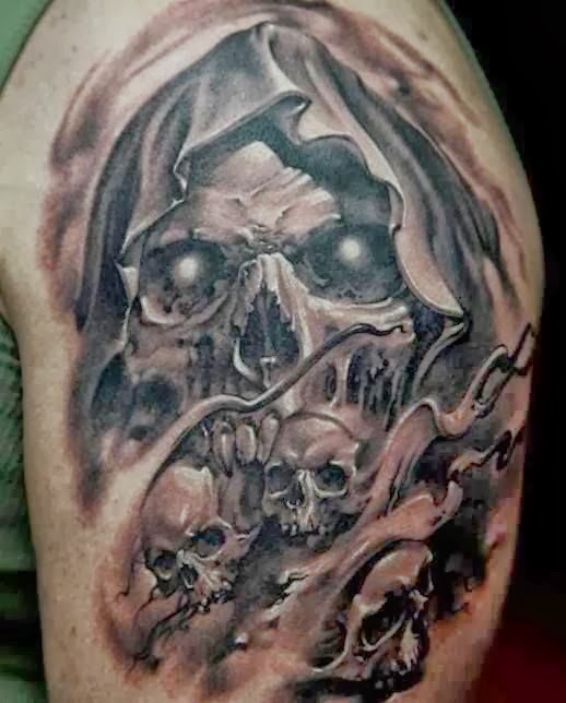 Ripped Skin Skull Tattoo Design