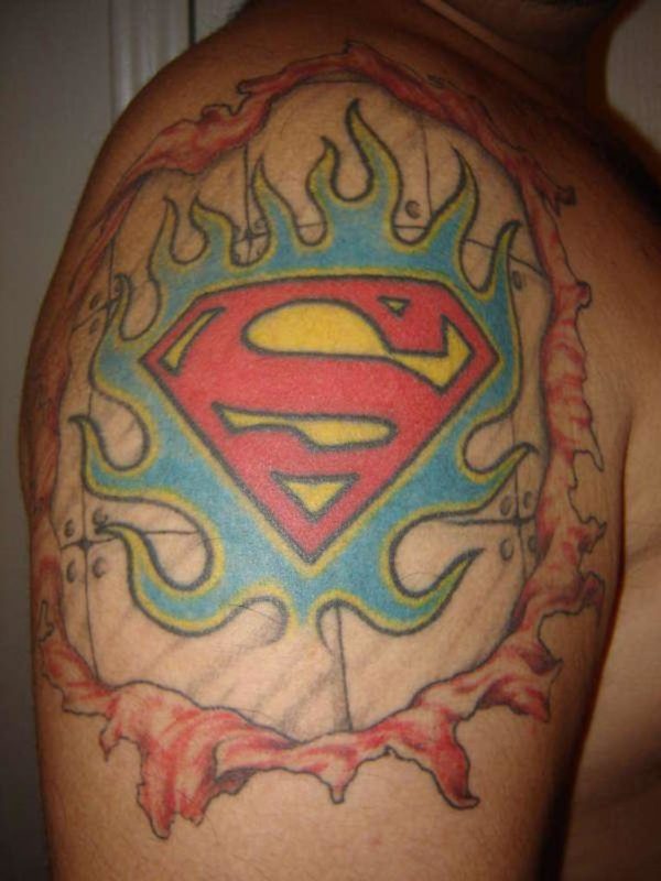 Ripped Superman Tattoo On Shoulder
