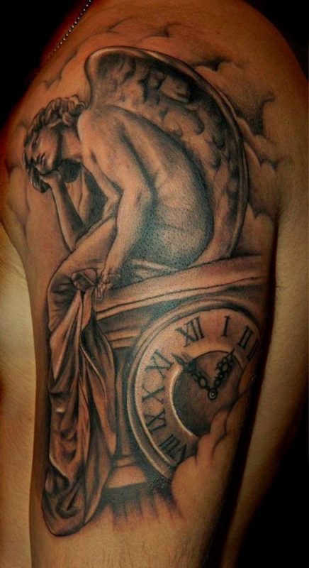 Sad Angel Shoulder Tattoo On Left Shoulder